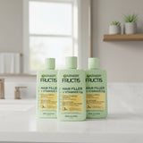 Garnier Fructis Hair Filler + Vitamin E shampoo bottle on a white background