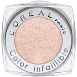 L’Oréal Paris Infallible 020 Hourglass Beige eye makeup. A 24-hour liquid-to-powder eyeshadow in a luminous, pale champagne-beige shade with a subtle metallic shimmer, shown in a sleek clear tube