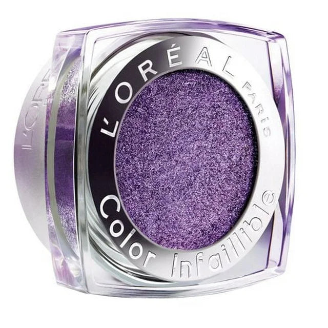 L’Oréal Paris Infallible 005 Purple Obsession eye makeup. A vibrant, high-pigment liquid-to-powder eyeshadow in a deep amethyst purple shade with a soft metallic shimmer. The clear tube showcases the rich, jewel-toned pigment