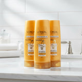 L'Oreal Paris Extraordinary Oil bottle on a gray background