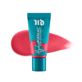 Urban Decay Hydromaniac Dewy Liquid Blush in “Drippin,” a warm golden peach shade with a glossy, radiant texture, shown swatched and applied on cheeks.