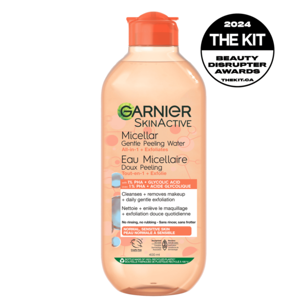 Garnier Skin Active Micellar Gentle Peeling Water bottle. A clear bottle with a yellow-tinted cap, formulated with 1% PHA and Papaya Enzyme for makeup removal and gentle daily exfoliation