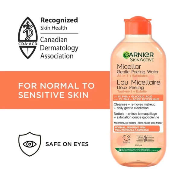 Garnier Skin Active Micellar Gentle Peeling Water bottle. A clear bottle with a yellow-tinted cap, formulated with 1% PHA and Papaya Enzyme for makeup removal and gentle daily exfoliation